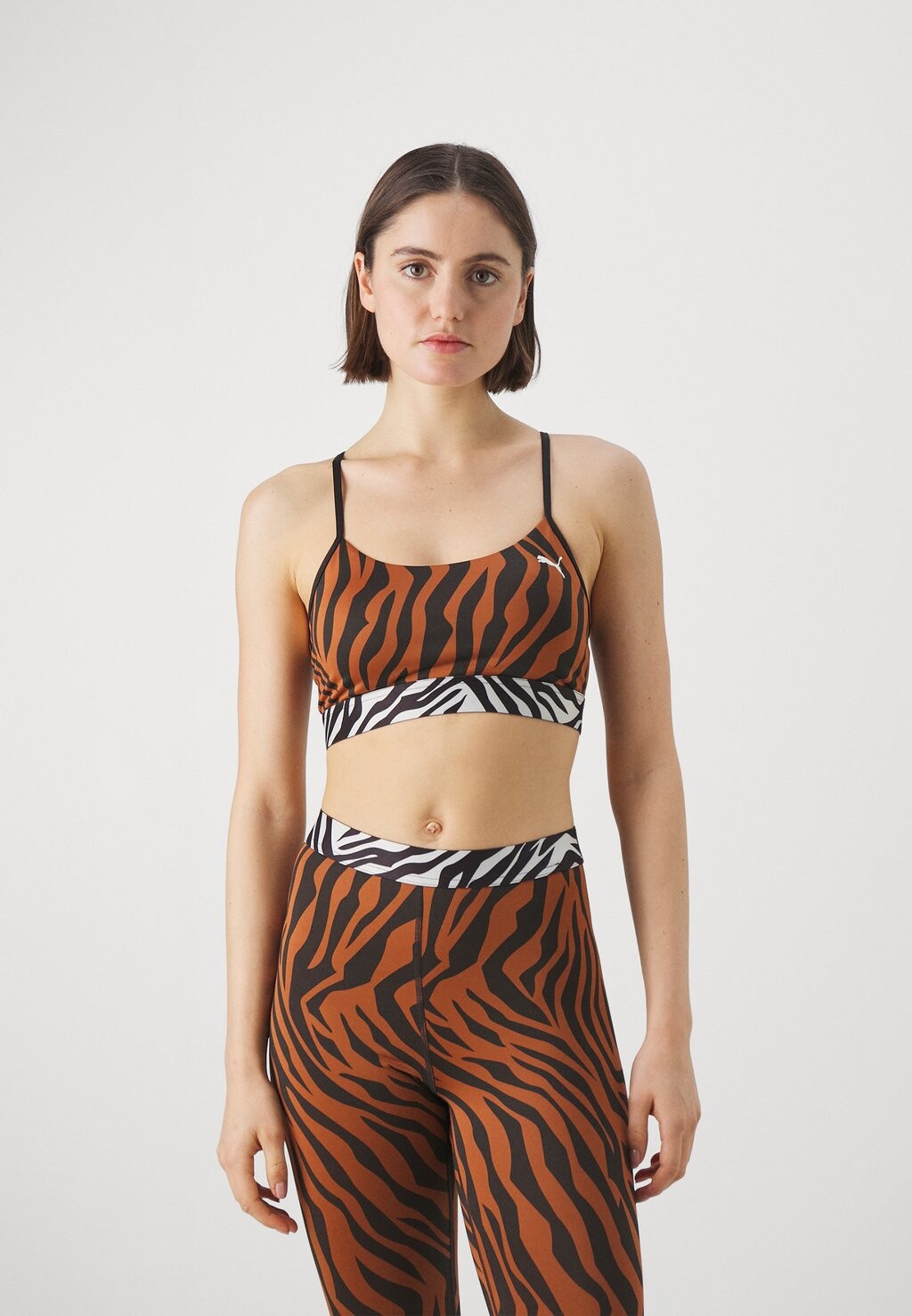 

Спортивный бюстгальтер с легкой поддержкой MOVE ANIMAL REMIX BRA Puma, цвет teak
