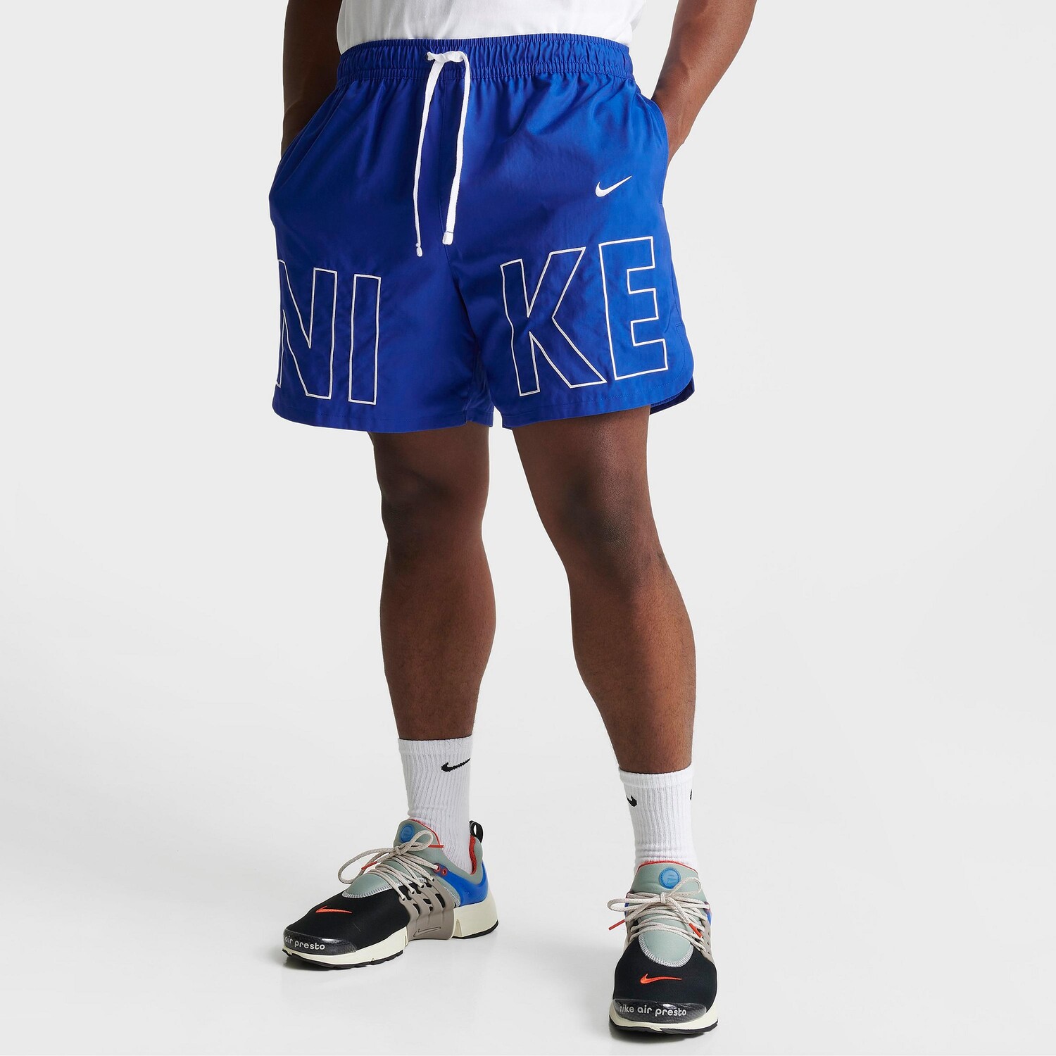 

Мужские шорты из струящейся ткани с вышивкой Nike Sportswear, синий
