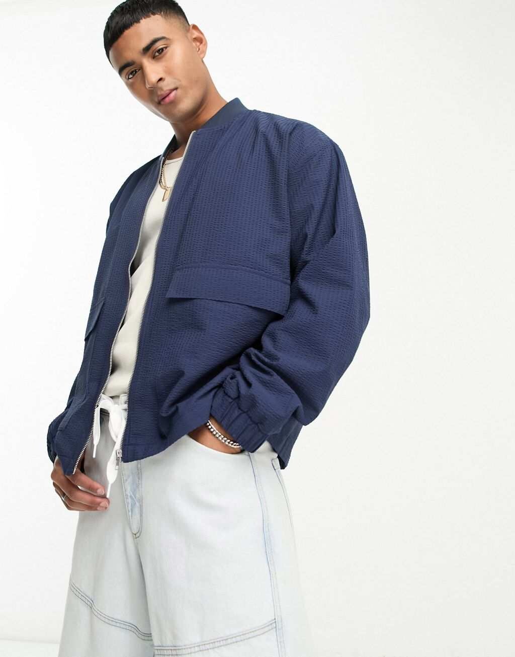 

Темно-синий объемный бомбер из жатого хлопка ASOS DESIGN