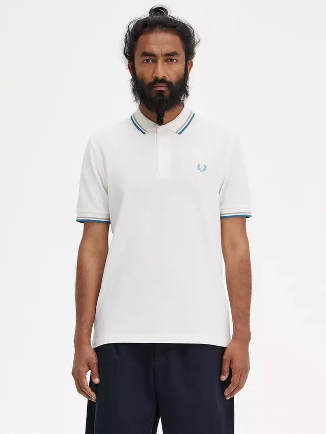 

Футболка Fred Perry The Twin Tipped Short Sleeve, цвет v36/snwh/wrmgre/ocea
