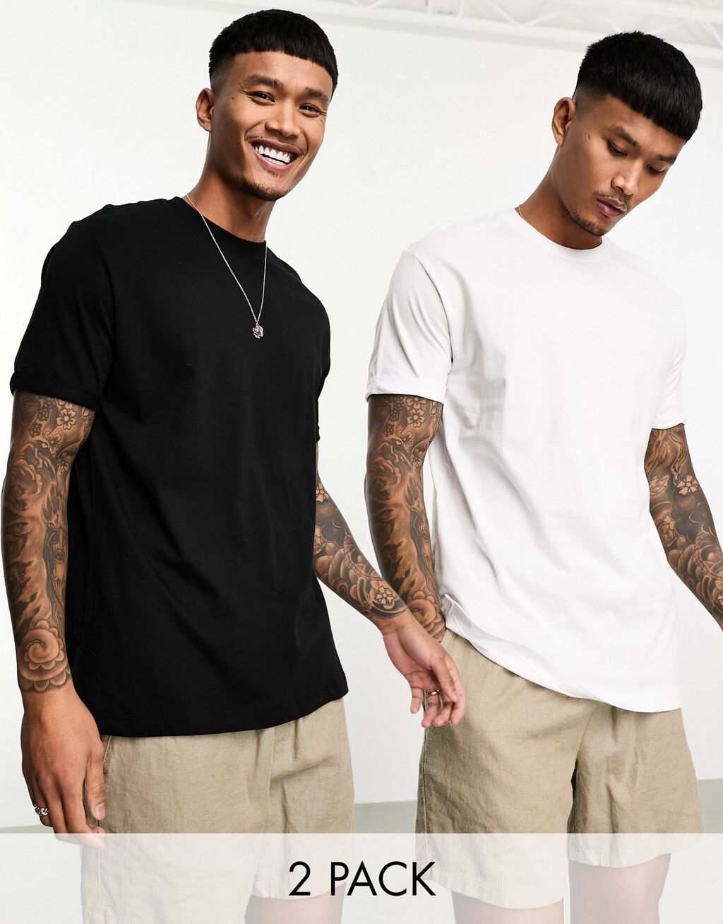 

Набор из двух черных и белых удлиненных футболок Bershka, Черный