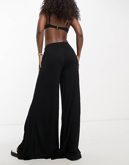 

Черные пляжные брюки-палаццо из джерси ASOS DESIGN, Черный