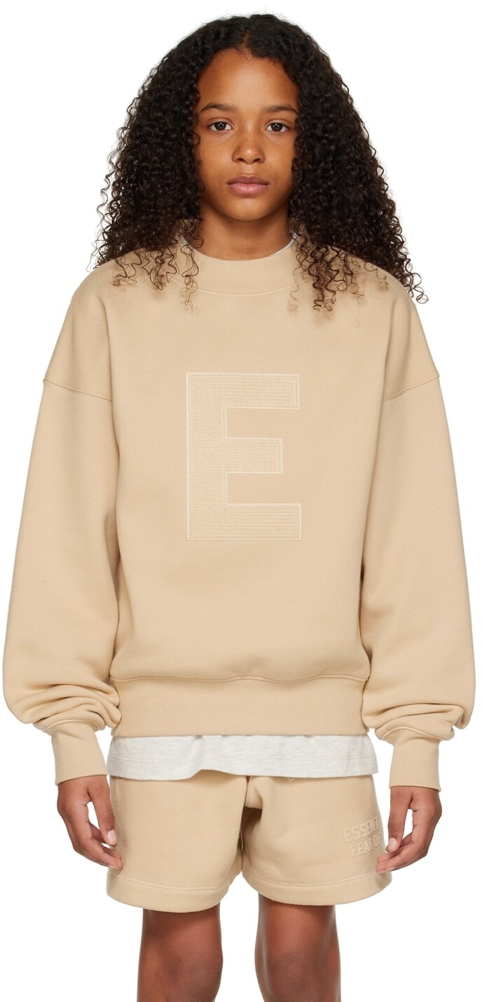 

Детский бежевый свитшот E Fear of God ESSENTIALS