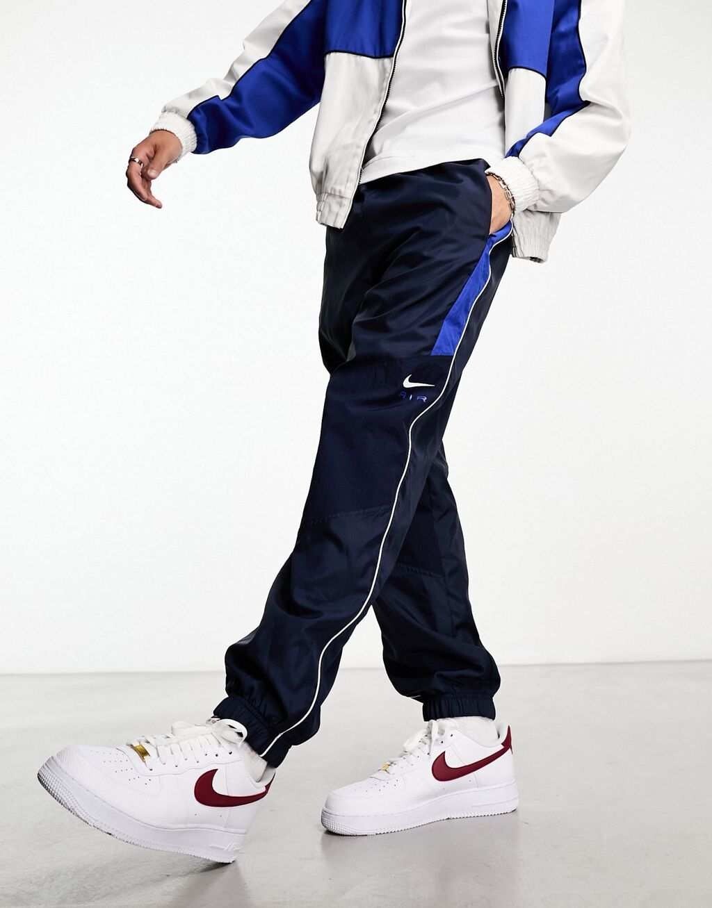 

Темно-синие тканые джоггеры Nike Swoosh Air