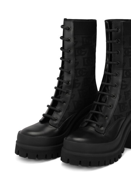 

Ботильоны из эластичной сетки с логотипом DG по всей поверхности. Dolce & Gabbana, черный