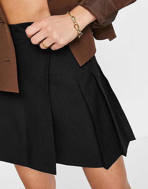 

Черная плиссированная мини-юбка ASOS DESIGN
