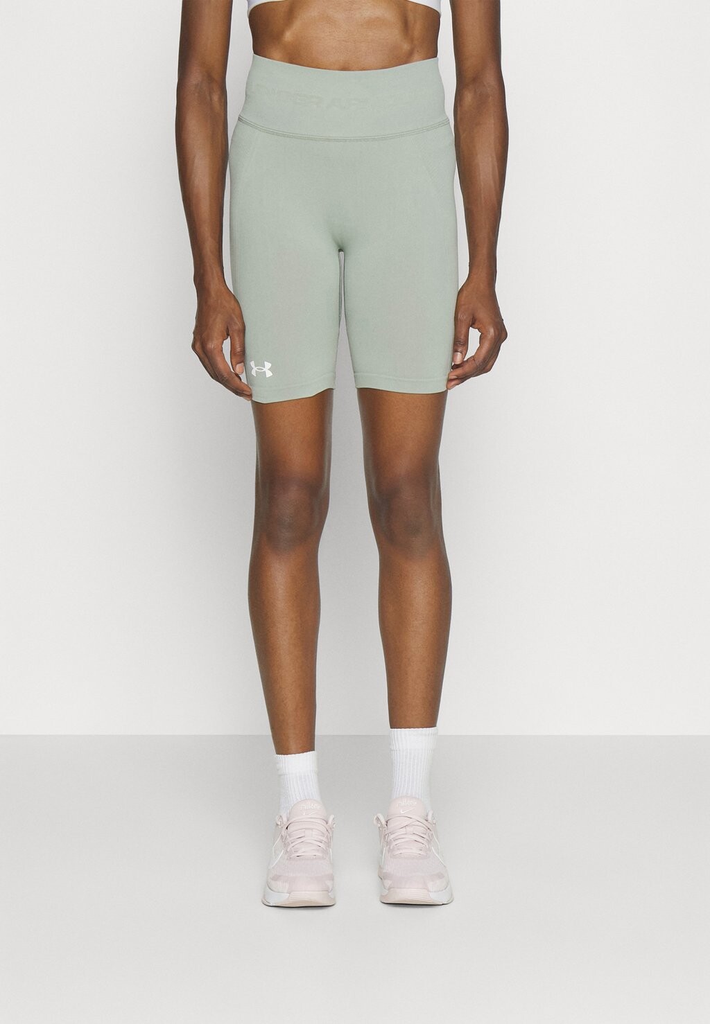 

Тайтсы Under Armour, зеленый/белый