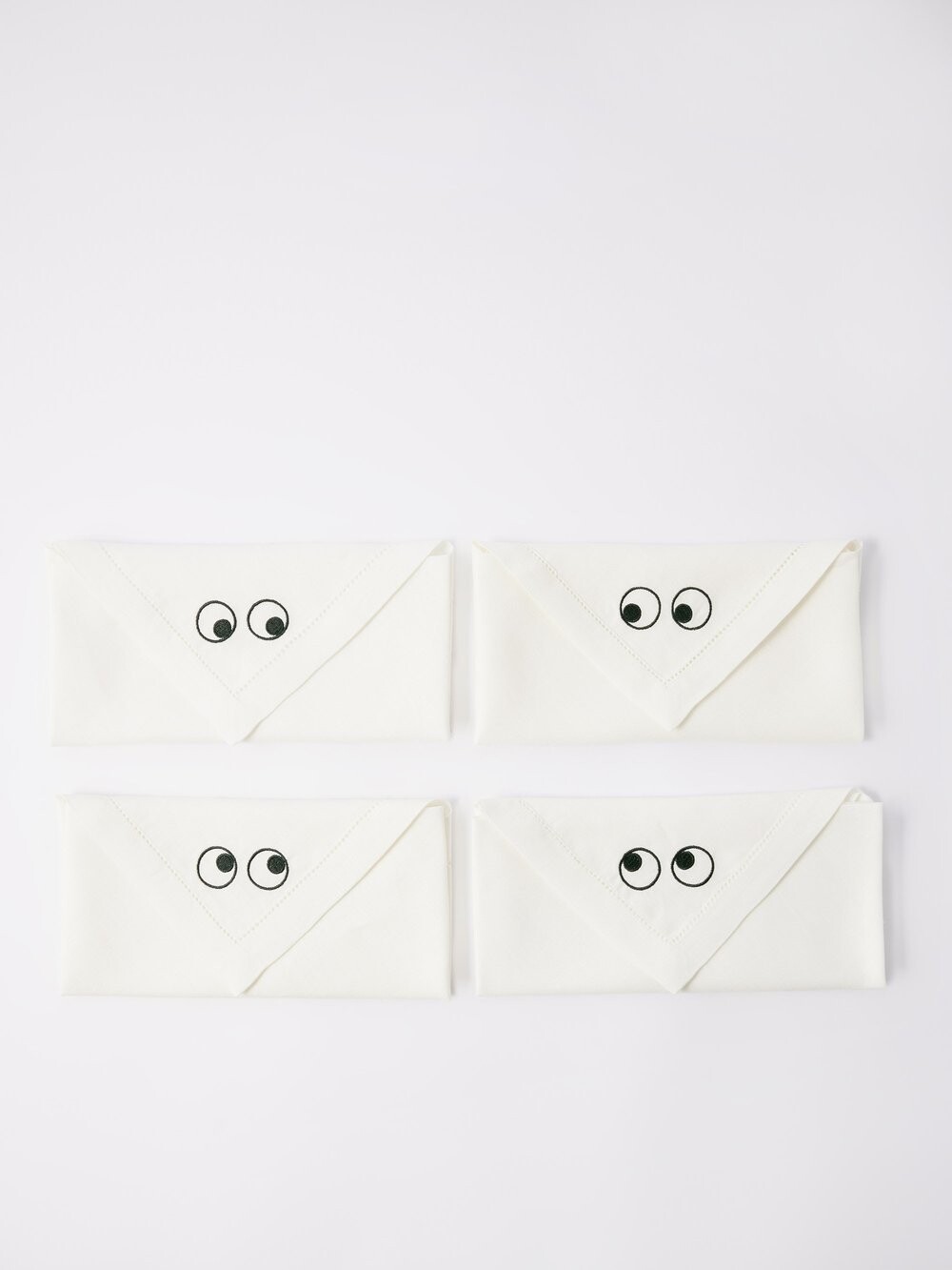 

Набор "глаза" из четырех льняных салфеток. Anya Hindmarch, белый