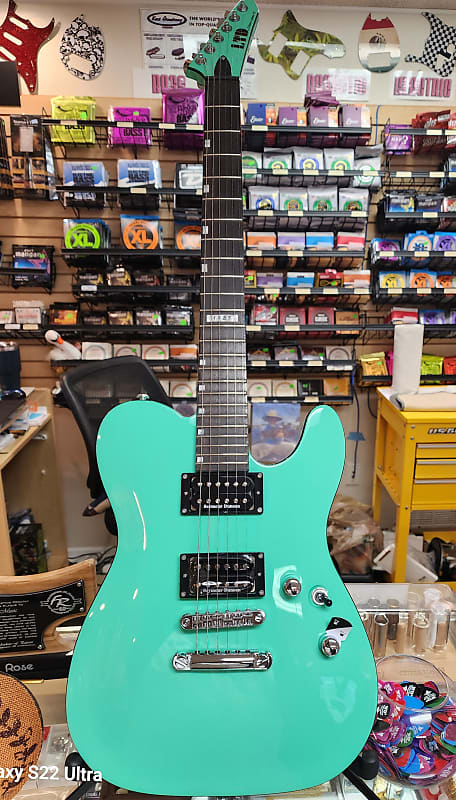 

Электрогитара ESP LTD Eclipse '87 NT w Free ESP $200 Case Turquoise non tremolo