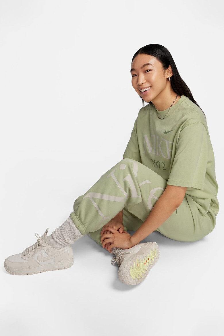 

Спортивные брюки с зауженными штанинами и косыми карманами Nike, хаки