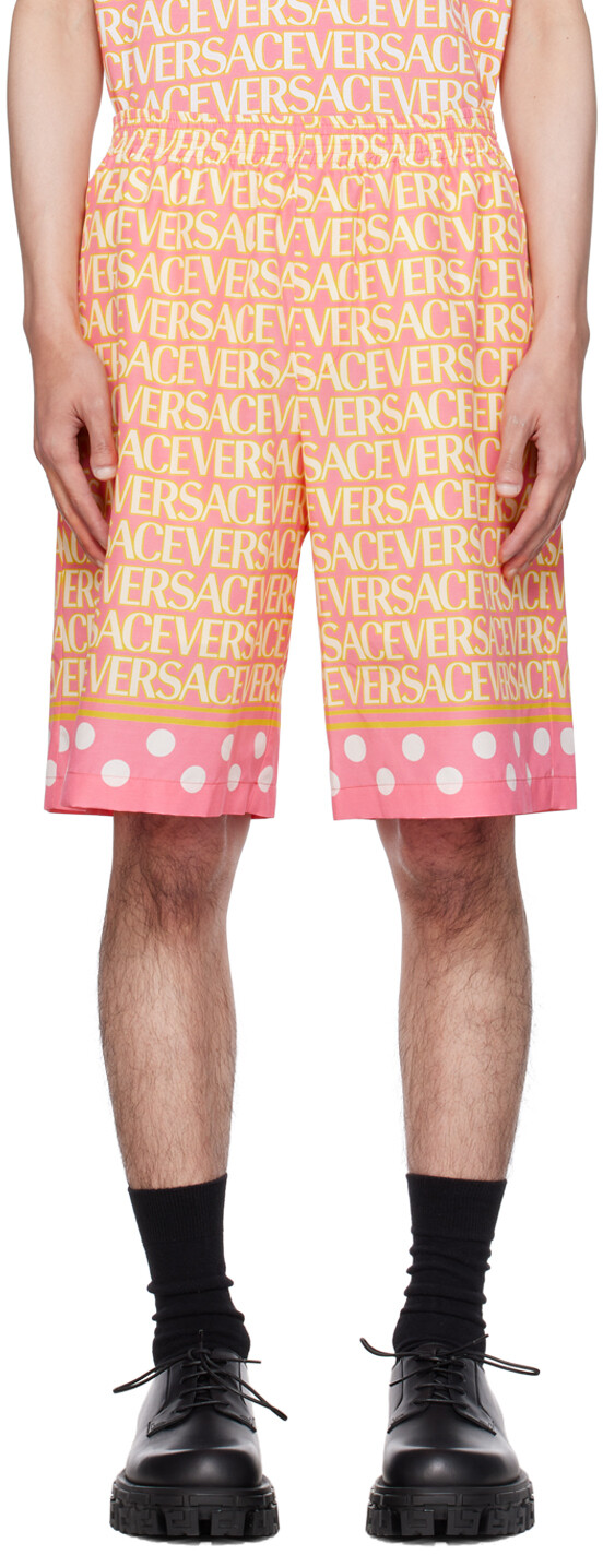 

Розово-желтые шорты по всей длине Versace