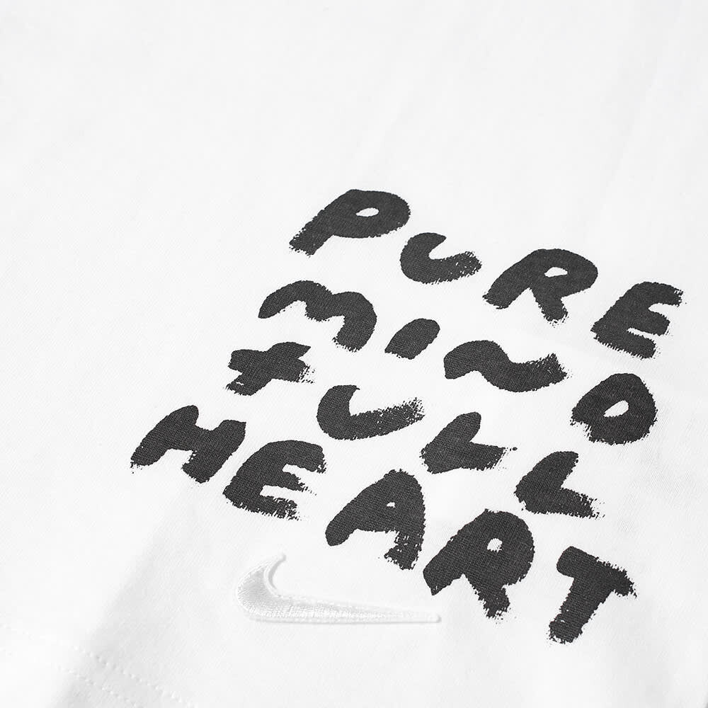 

Футболка с надписью Comme des Garçons Black x Nike, белый