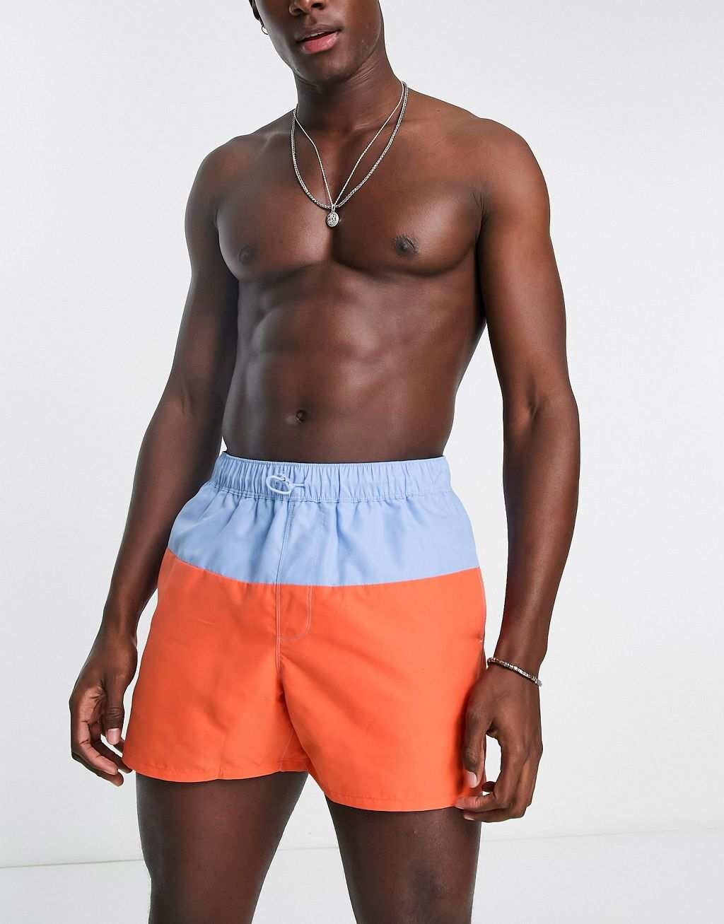 

Короткие шорты для плавания с цветными блоками ASOS DESIGN синего и оранжевого цвета