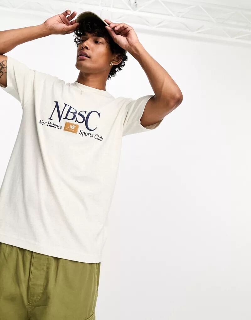 

Бежевая футболка New Balance Athletics NB Sports Club