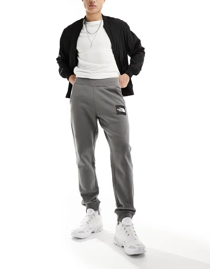 

Серые джоггеры The North Face NSE Alpine