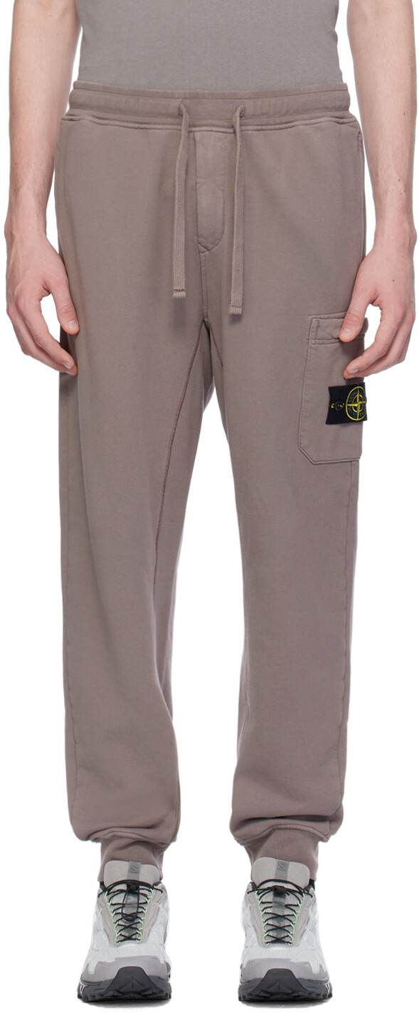 

Спортивные штаны с фиолетовыми нашивками Stone Island