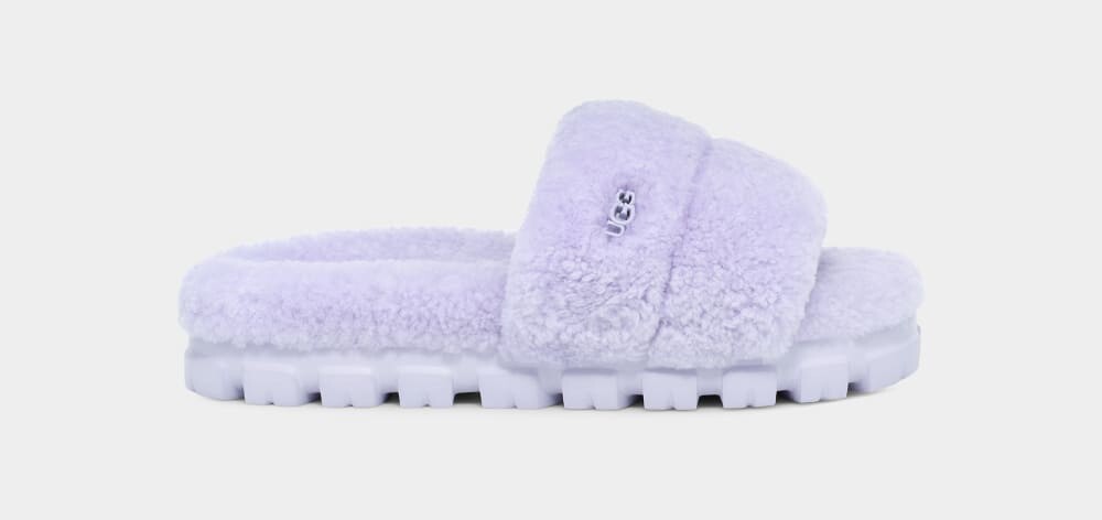 

Домашние тапочки Cozetta Curly UGG, сиреневый