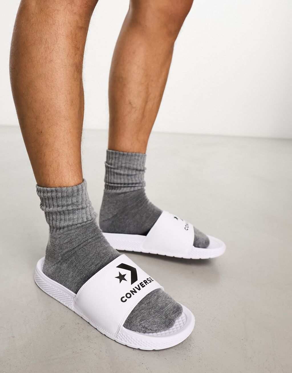 

Белые шлепанцы Converse All Star