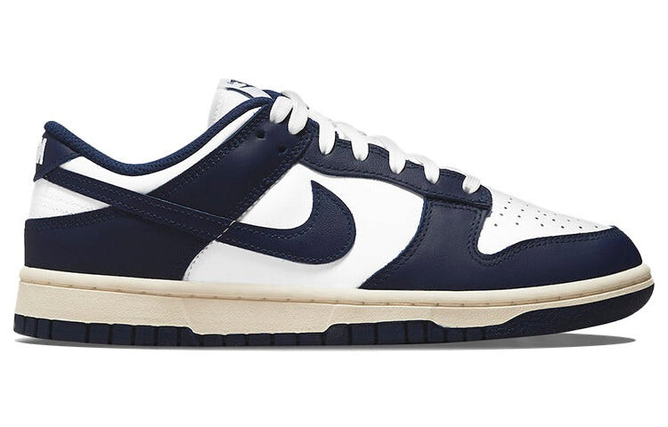 

Кроссовки Nike Dunk Low женские, белый / черный