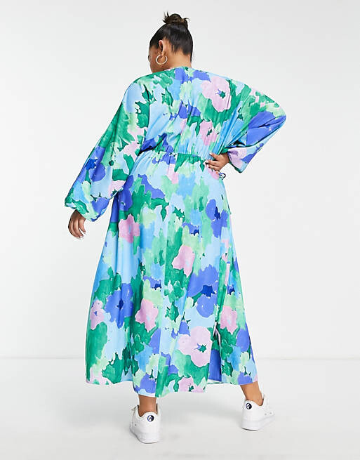 

Платье миди с эластичным поясом и рукавами «летучая мышь» ASOS DESIGN Curve с искаженным цветочным принтом