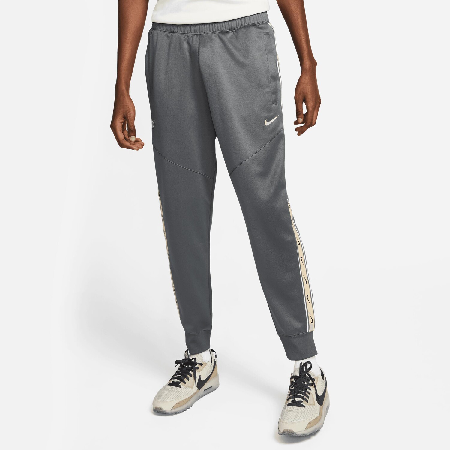 

Брюки Nike Jogginghose Repeat, темно-серый