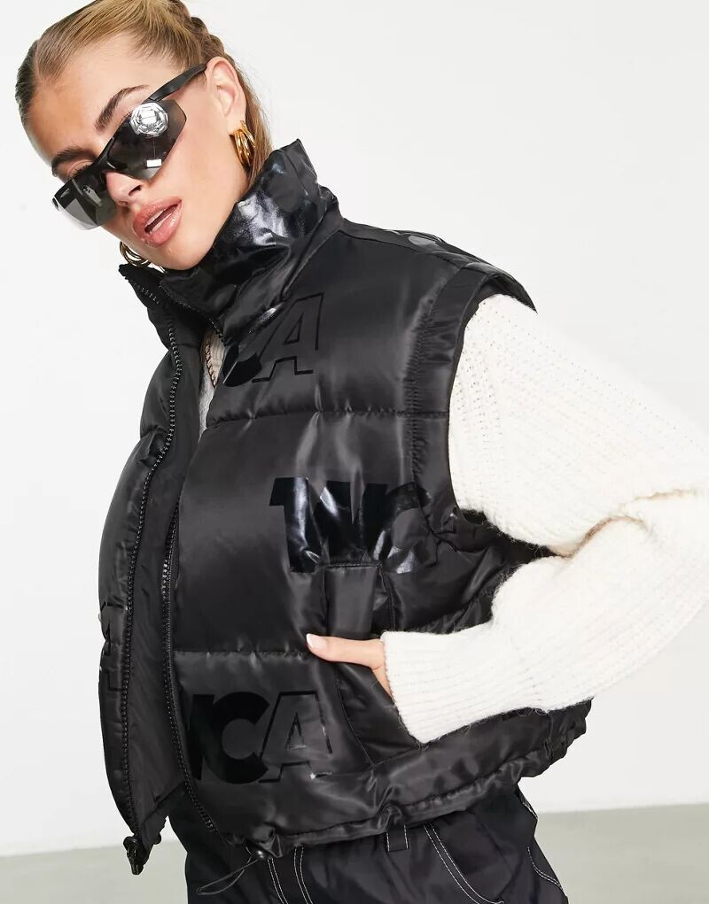 

Черная двусторонняя дутая куртка со съемными рукавами на молнии ASOS