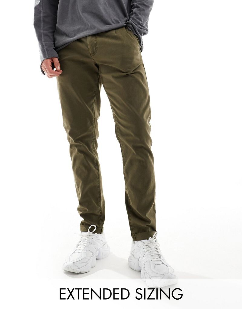 

Узкие чиносы темного цвета хаки ASOS DESIGN