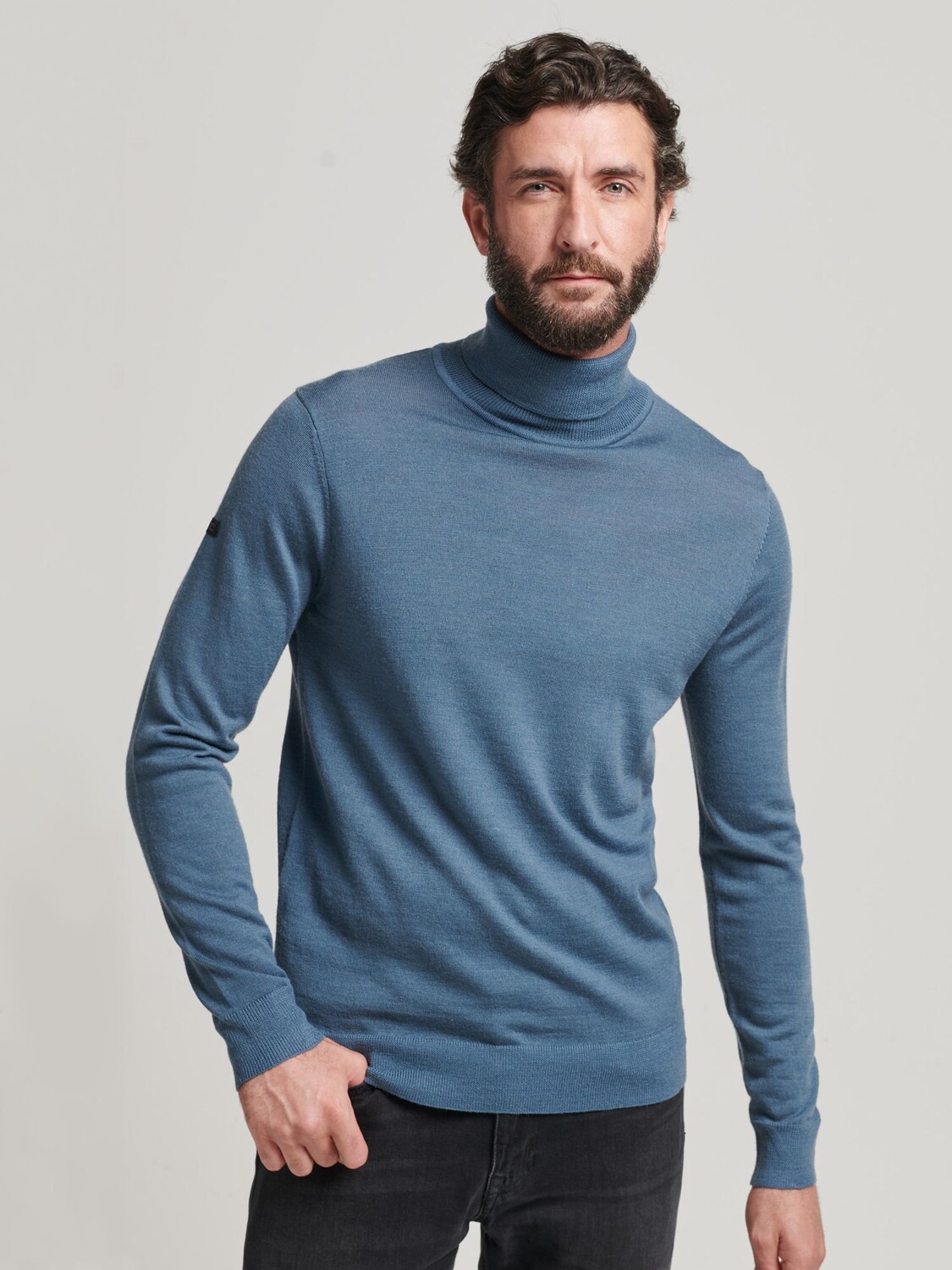 

Джемпер с высоким воротником Superdry Studios Merino, цвет Dry Slate Blue