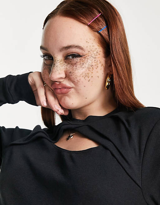 

Черный топ с вырезами и длинными рукавами Nike Icon Clash