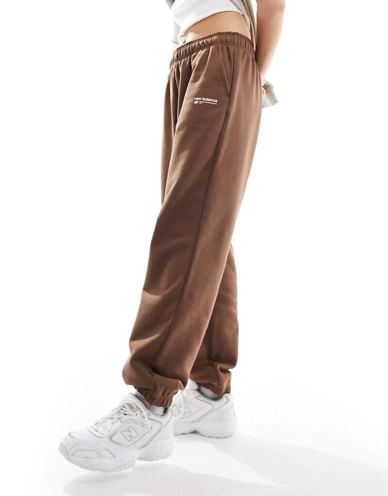 

Коричневые флисовые джоггеры с начесом New Balance Linear Heritage