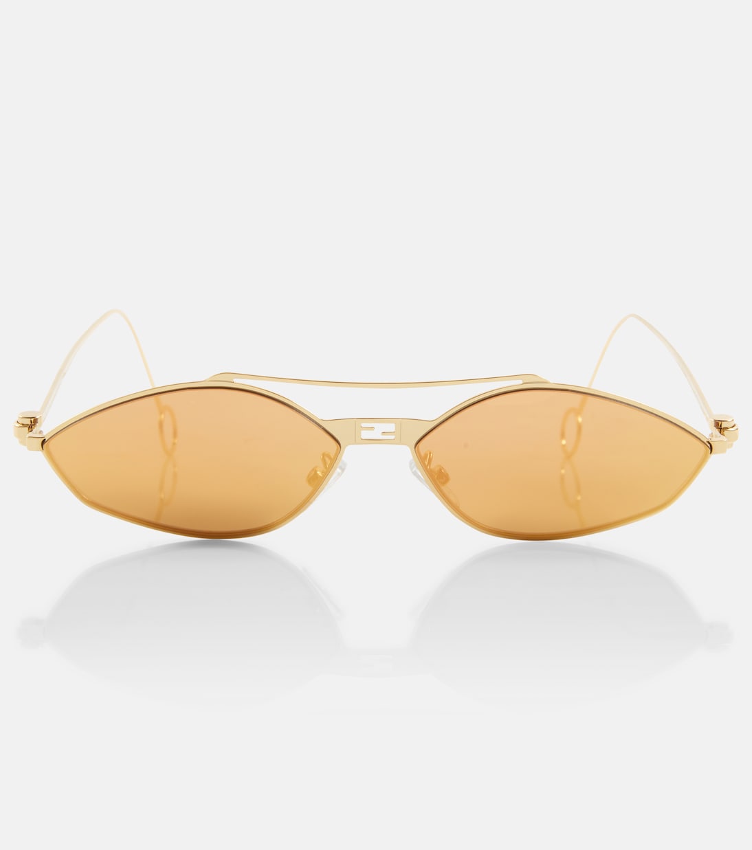 цена Овальные солнцезащитные очки Fendi, золото