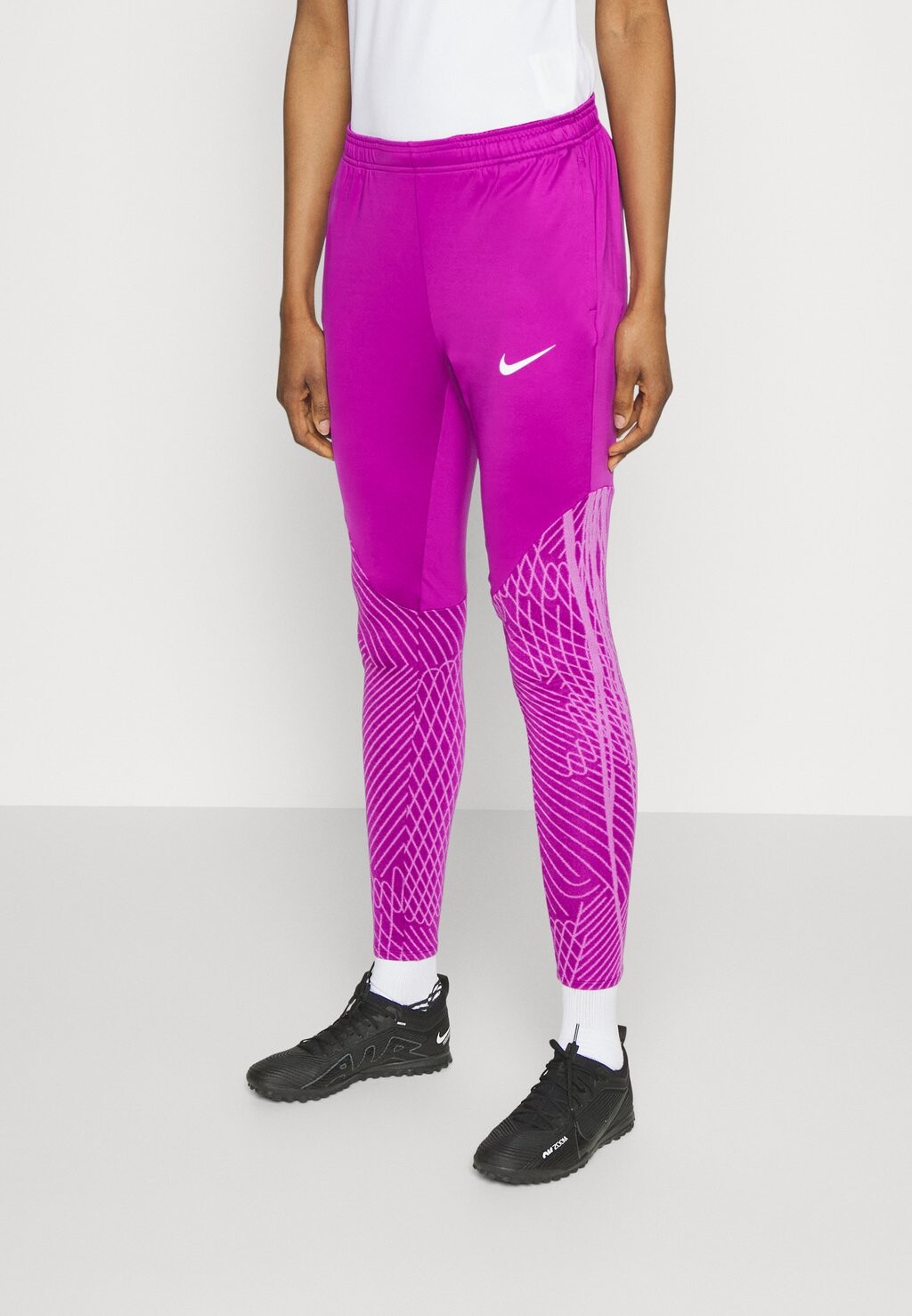 

Спортивные брюки Nike, ярко-фиолетовый/белый