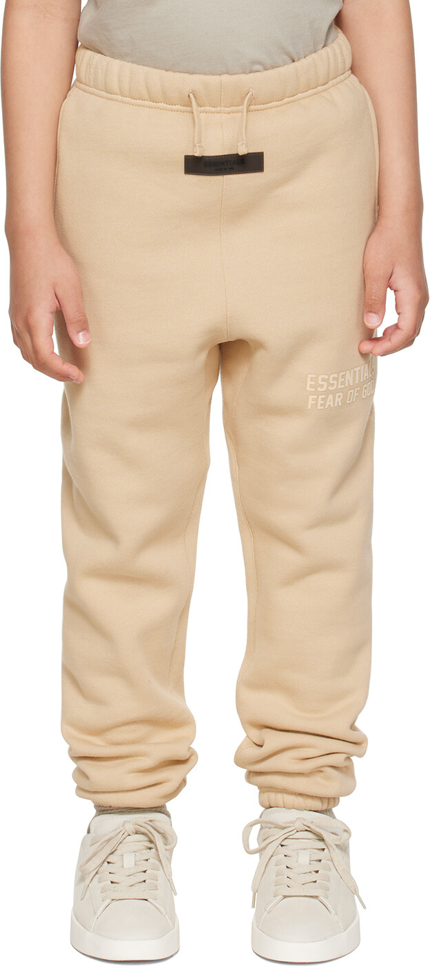 

Детские бежевые брюки для отдыха на связках Fear of God ESSENTIALS