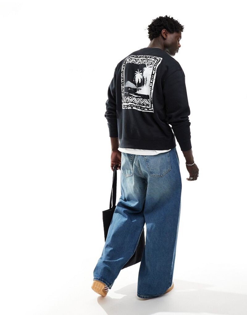 

Levi's – черная свободная толстовка с логотипом и изображением ладони на спине