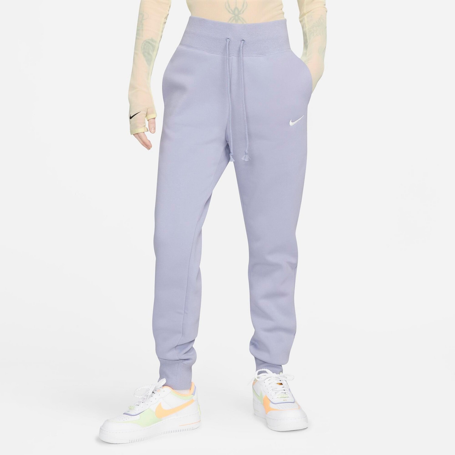 

Женские флисовые спортивные штаны для бега с высокой талией Nike Sportswear Phoenix, фиолетовый