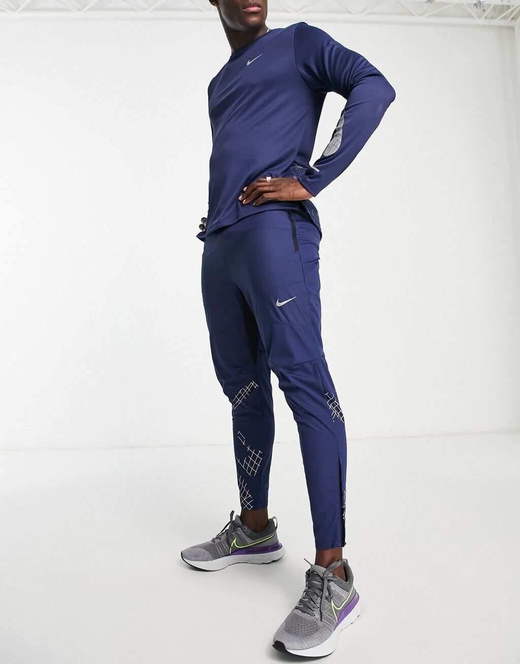 

Темно-синие джоггеры со светоотражающими элементами Nike Running Run Division Phenom Elite Flash
