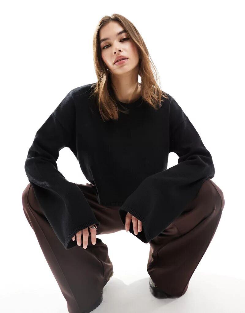 

Черный вязаный укороченный топ с длинными рукавами Monki