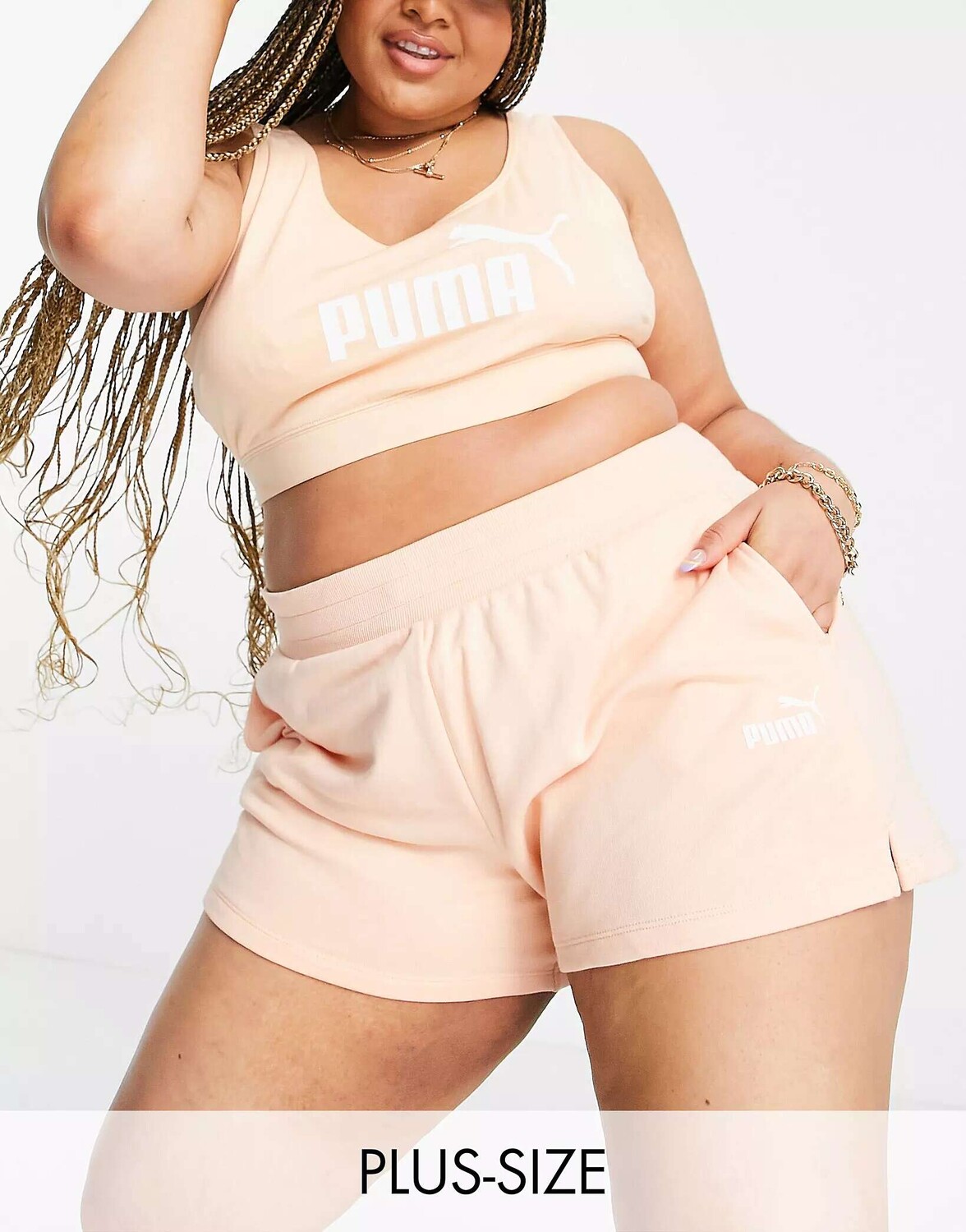 

Персиковые спортивные шорты с логотипом Puma Plus Essentials