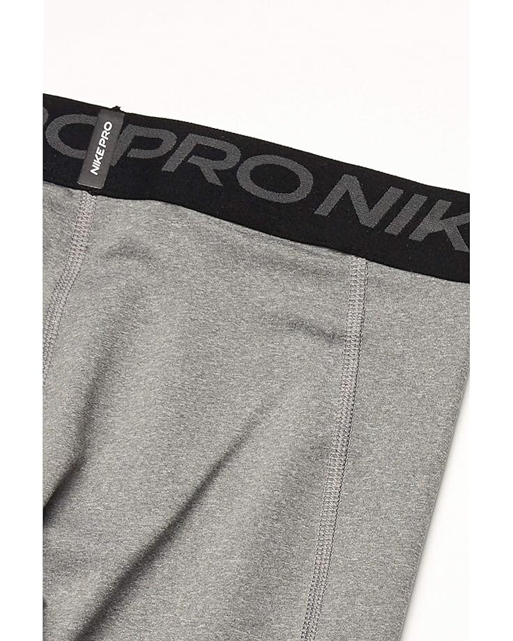 

Брюки Nike Pro 3/4 Tights, цвет Carbon Heather/Cool Grey/White
