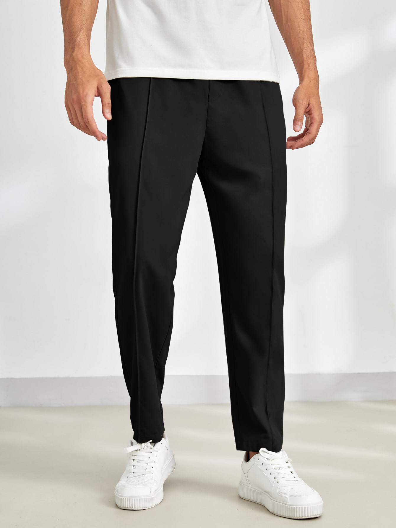 цена Мужские однотонные повседневные зауженные брюки Manfinity Homme с эластичной резинкой на талии, черный