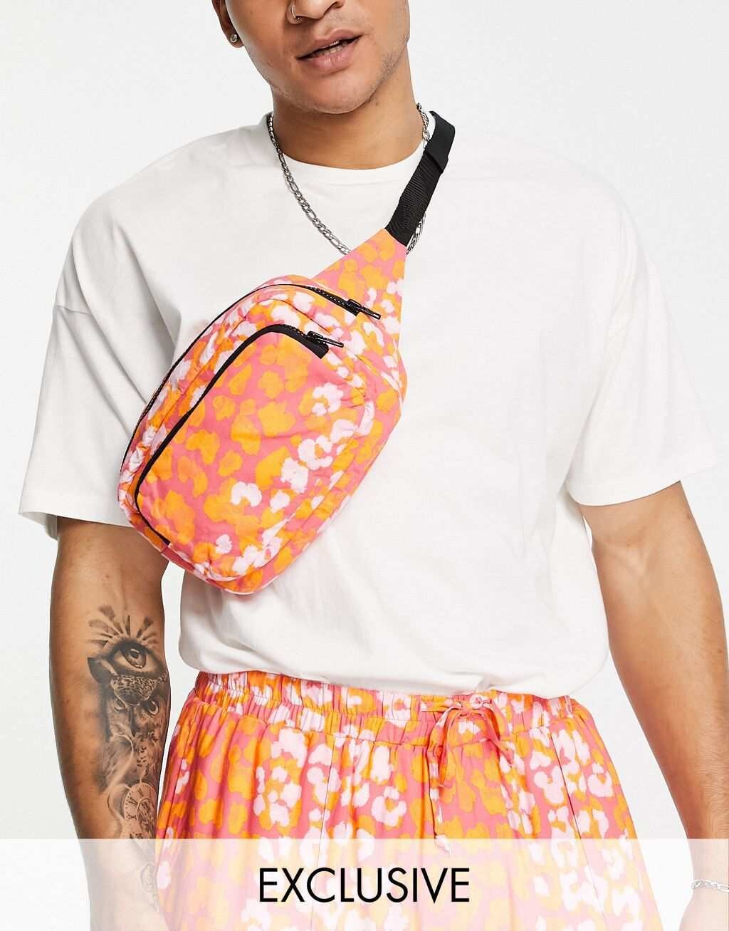 

Коралловая сумка-пояс с животным принтом ASOS MADE IN KENYA
