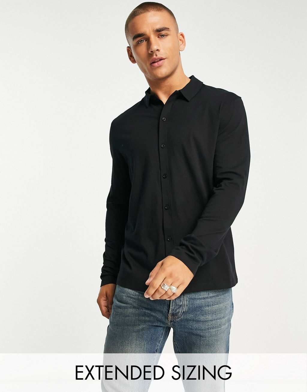 

Черная трикотажная рубашка с длинным рукавом и пуговицами ASOS DESIGN