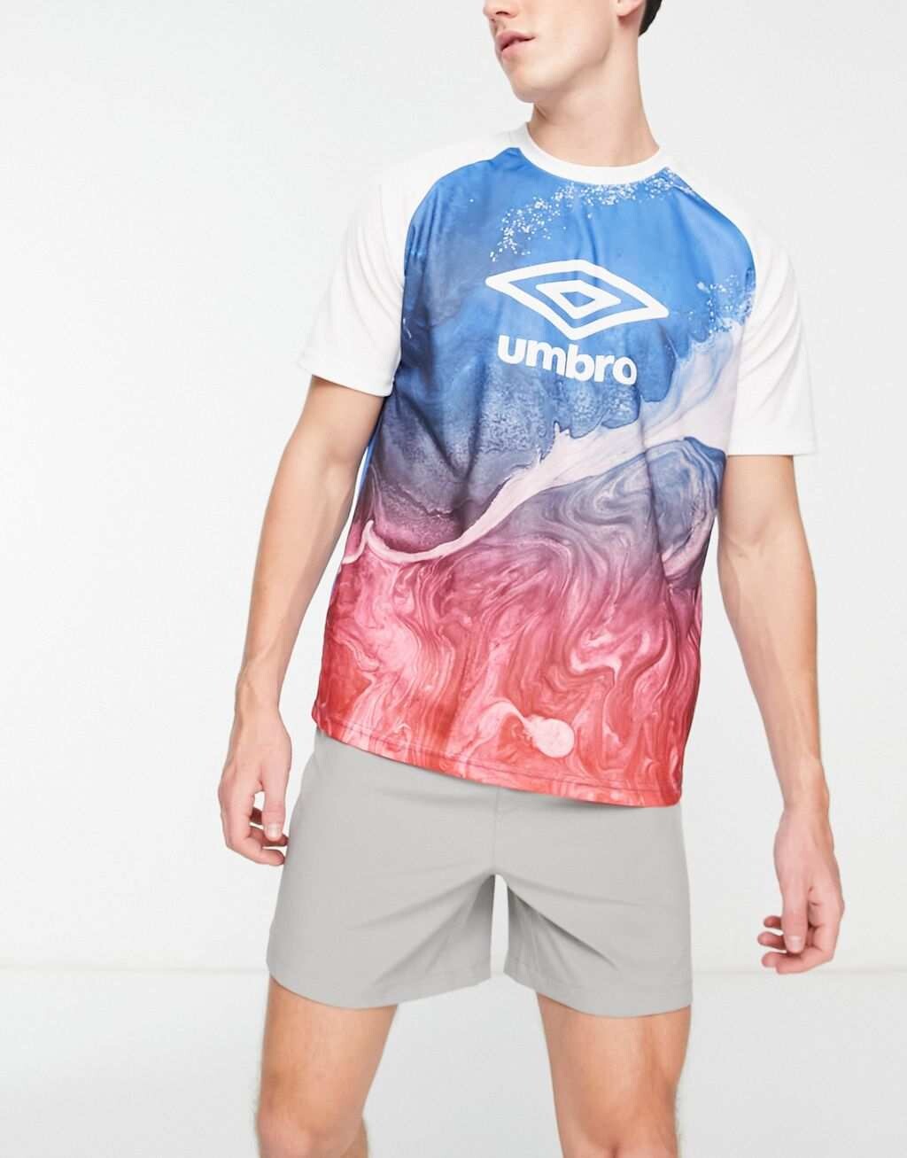 

Бело-синяя трикотажная футболка Umbro Home Turf, Синий