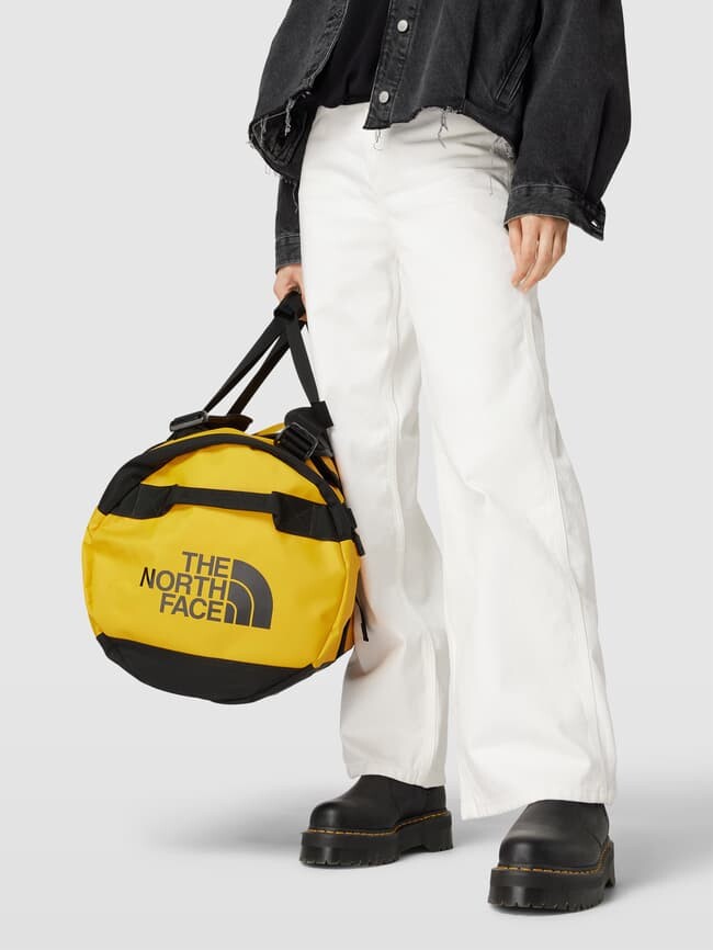 

Модель Weekender с принтом этикетки «BASE CAMP DUFFEL M» The North Face, желтый