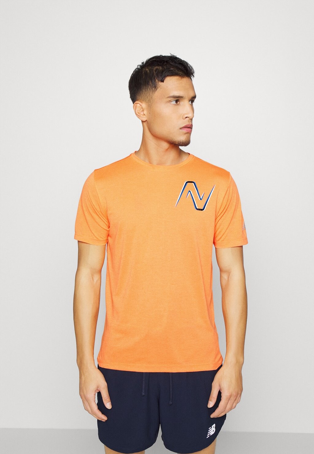 

Футболка с принтом GRAPHIC IMPACT RUN SHORT SLEEVE New Balance, апельсин