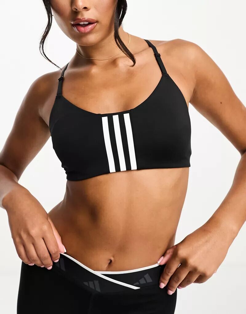 

Черный спортивный бюстгальтер с легкой поддержкой и 3 полосками adidas Training Train Icons adidas performance