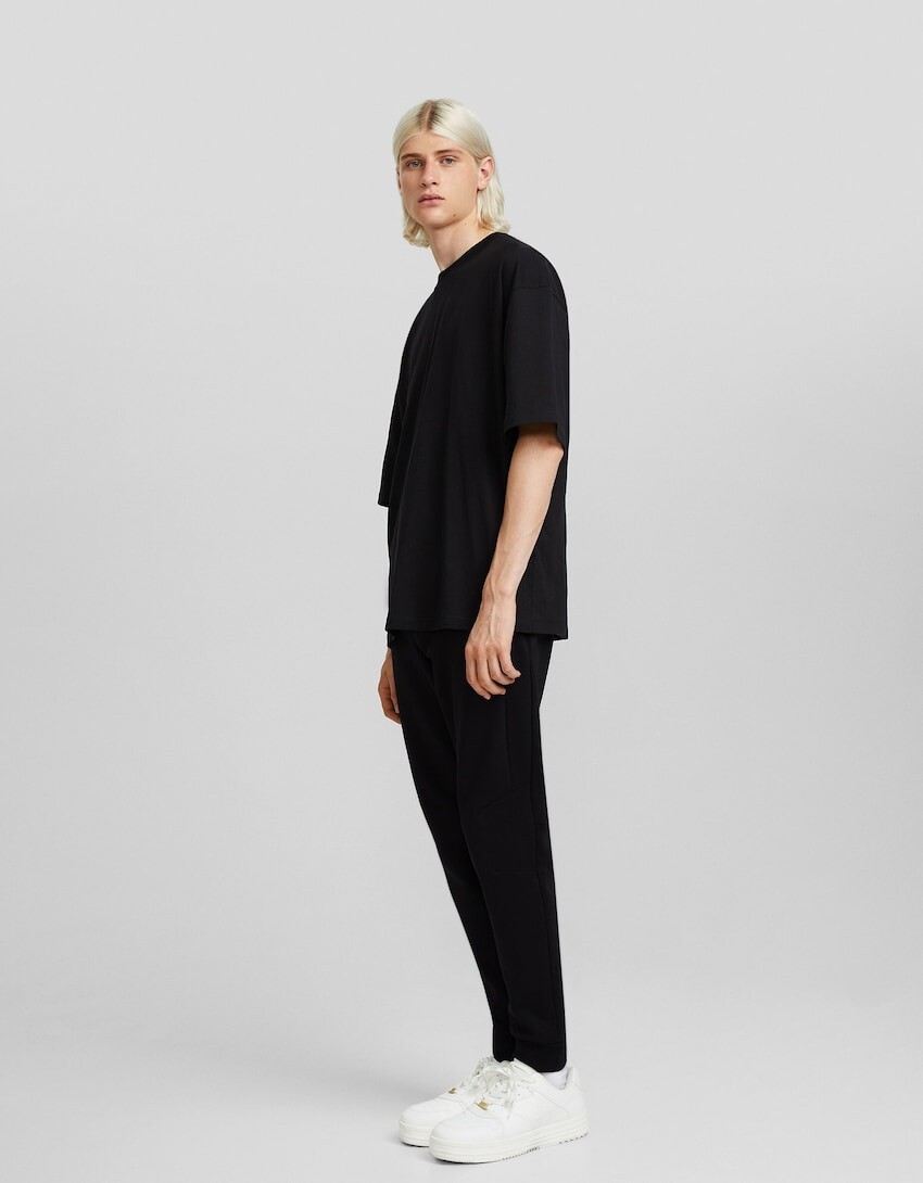 

Плюшевые брюки-джоггеры со швами Bershka, черный
