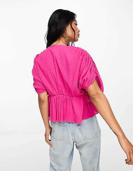 

Ярко-розовый топ с глубоким вырезом и завязками ASOS DESIGN