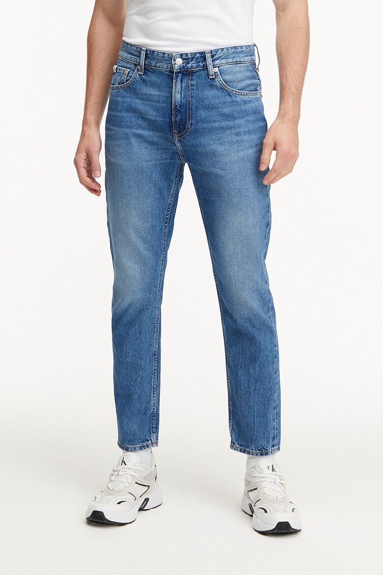

Джинсы узкого кроя с эффектом потертости Calvin Klein Jeans, синий