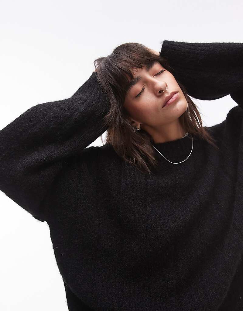 

Topshop – Черный вязаный свитер оверсайз с круглым вырезом в вертикальную рубчику